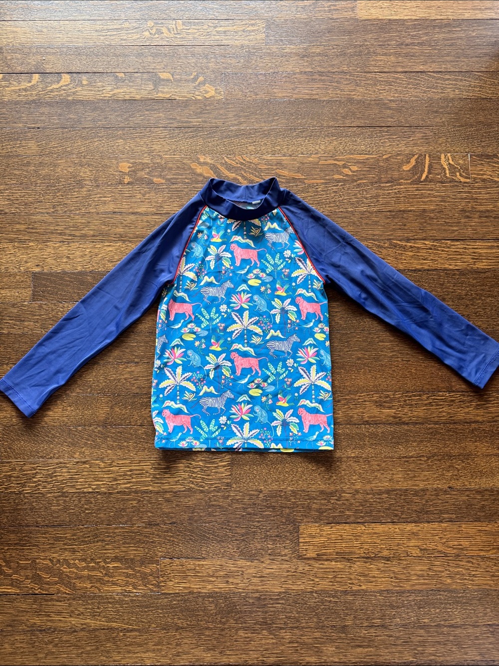 Mini Boden Blue Long-Sleeve Rash Guard with Tropical Animal Print - size 8-9